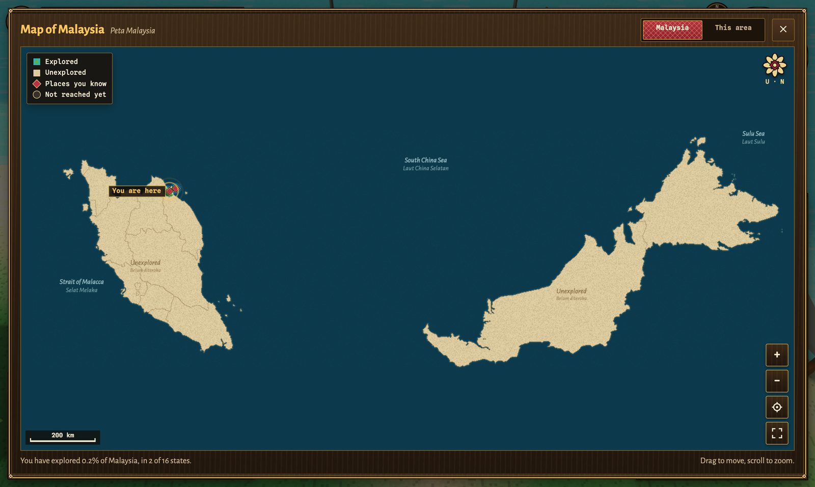A full-screen map of Malaysia in a carved teak frame: Peninsular Malaysia, Sarawak and Sabah alone in the sea as pale parchment marked Unexplored, the South China Sea between them, and a pulsing You are here marker on the east coast of the peninsula, with a legend, a compass rose, zoom buttons and a 200 km scale bar.
